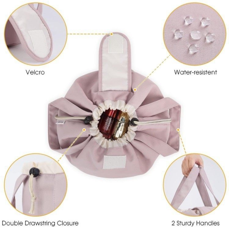 Pink drawstring bag with features highlighted on a white background