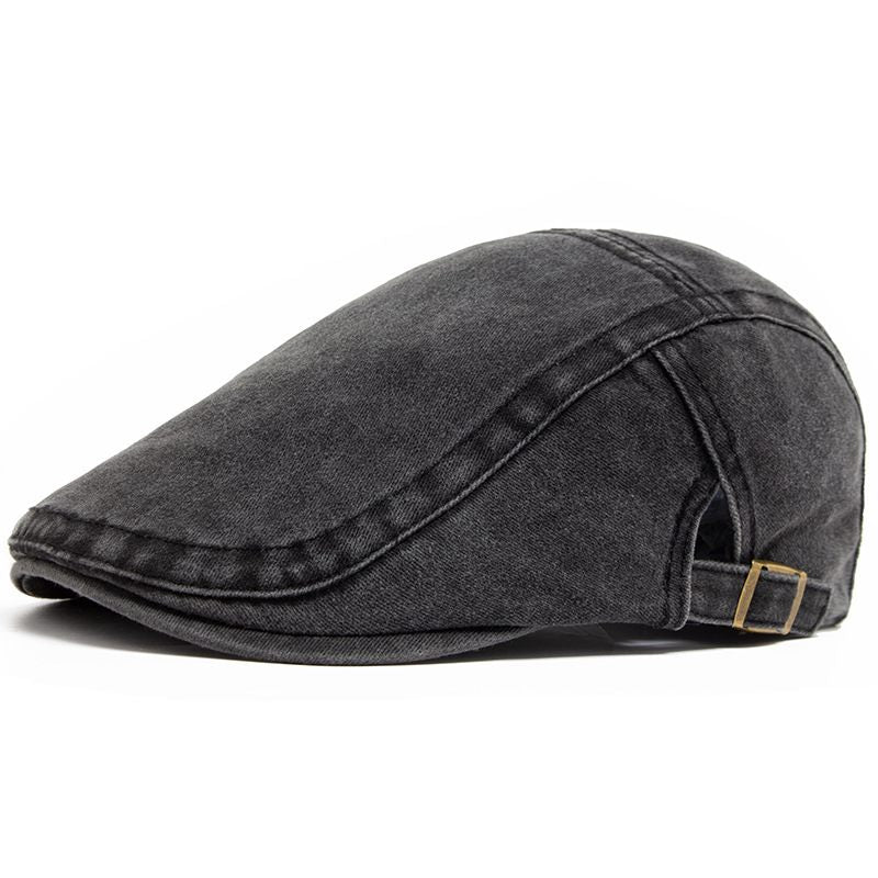 Black denim cap on a white background