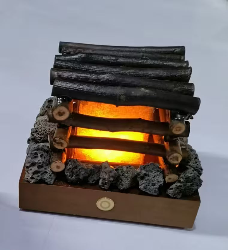 Decorative log cabin light with glowing interior on a white background