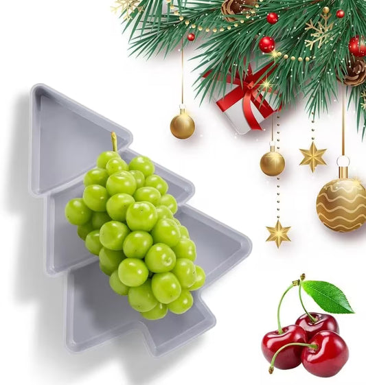 Christmas-themed decorative item with grapes and cherries on a white background