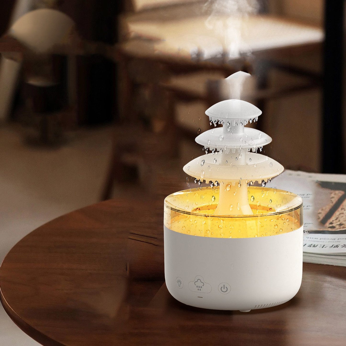 White humidifier with water droplets on a wooden table
