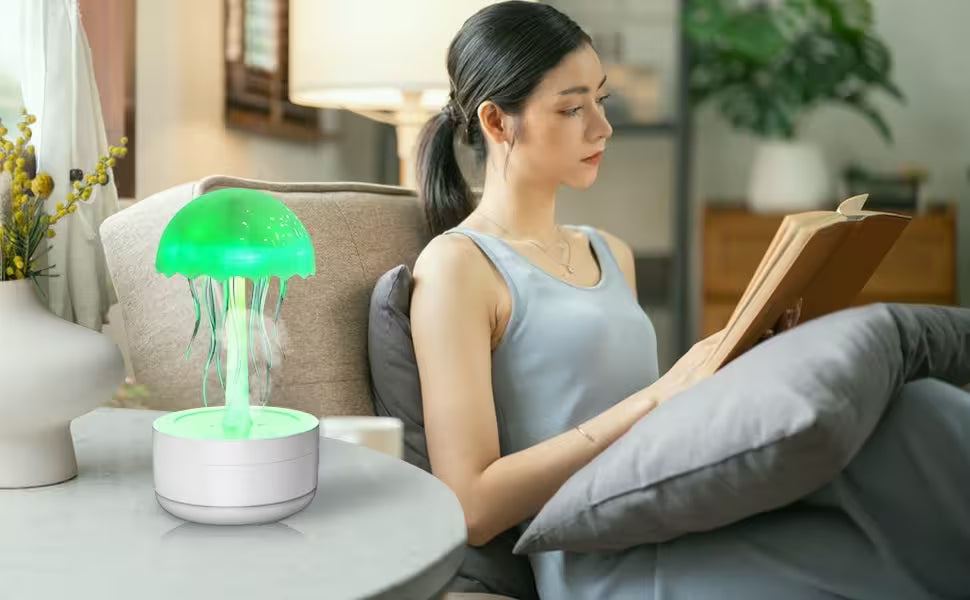 Woman reading a book with a green glowing lamp on a table in a cozy living room.