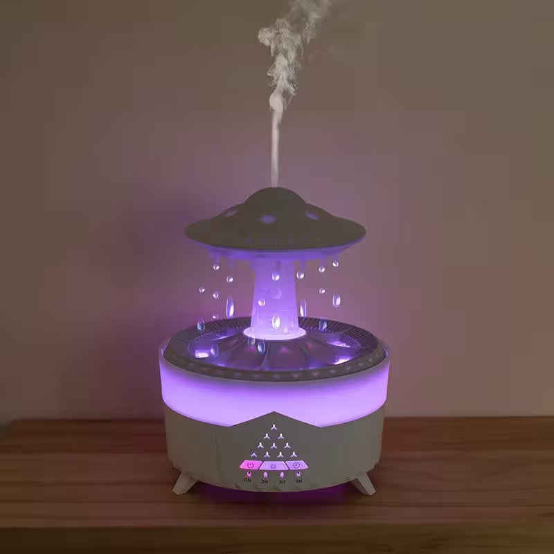 UFO-shaped humidifier emitting mist on a wooden surface with a dark background