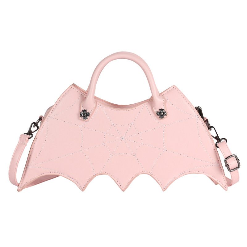 Pink bat-shaped handbag with straps on a white background