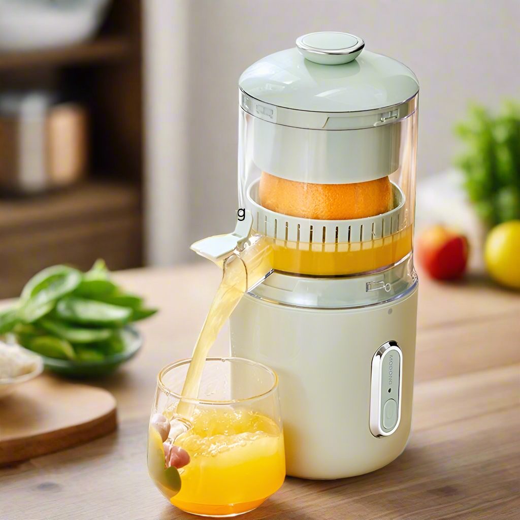 Juicer pouring orange juice into a glass on a wooden table.