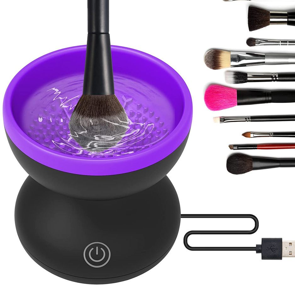 Makeup brush cleaning station with purple basin and black base, USB cable included.