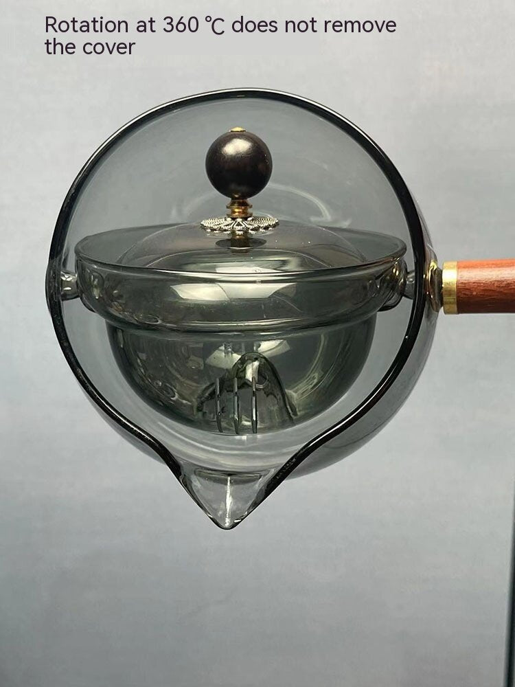 Rotary heat-resistant glass teapot