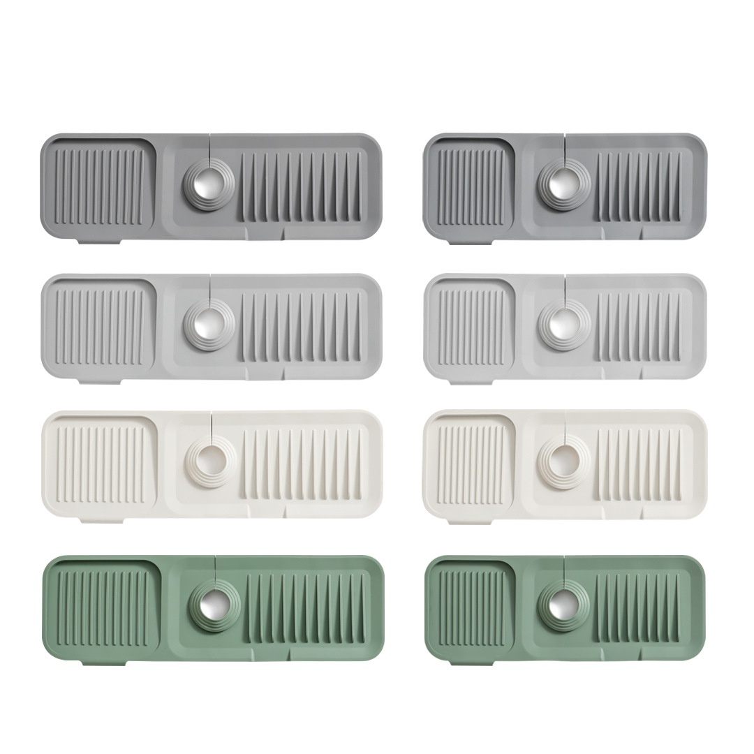Set of eight rectangular kitchen sink cutouts in various colors on a white background