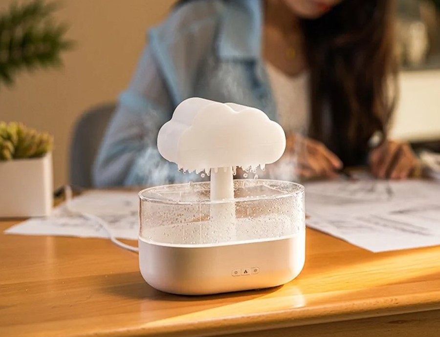Humidifier with cloud design on a desk in an office setting