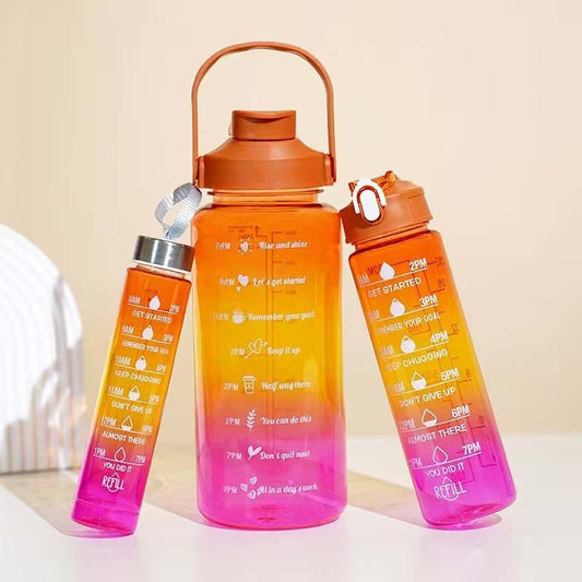 Gradient orange to pink water bottles with motivational text on a light background