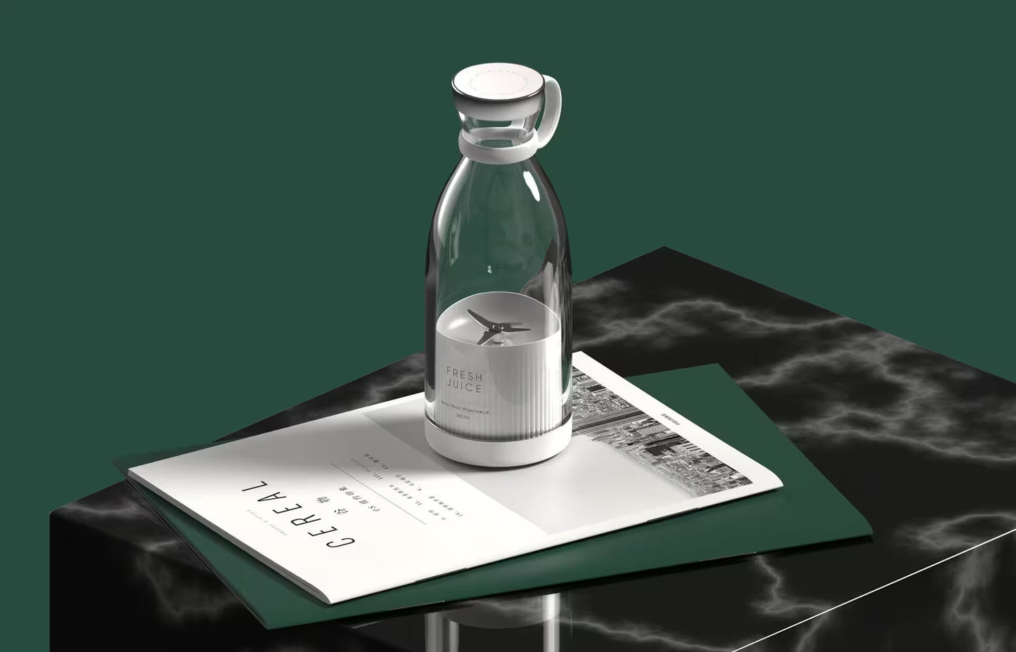 Clear glass carafe with white lid on a black marble surface with a magazine underneath