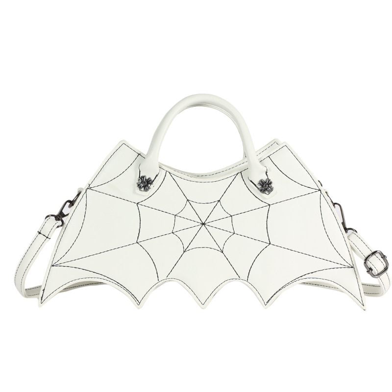 White handbag with spider web design on a white background