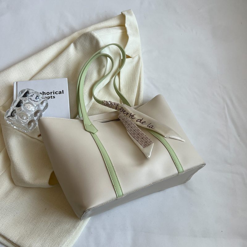 Gift box with a ribbon on a white surface