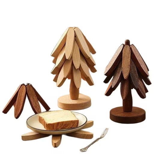 Wooden tree-shaped toast stands with a plate of toast and fork on a white background