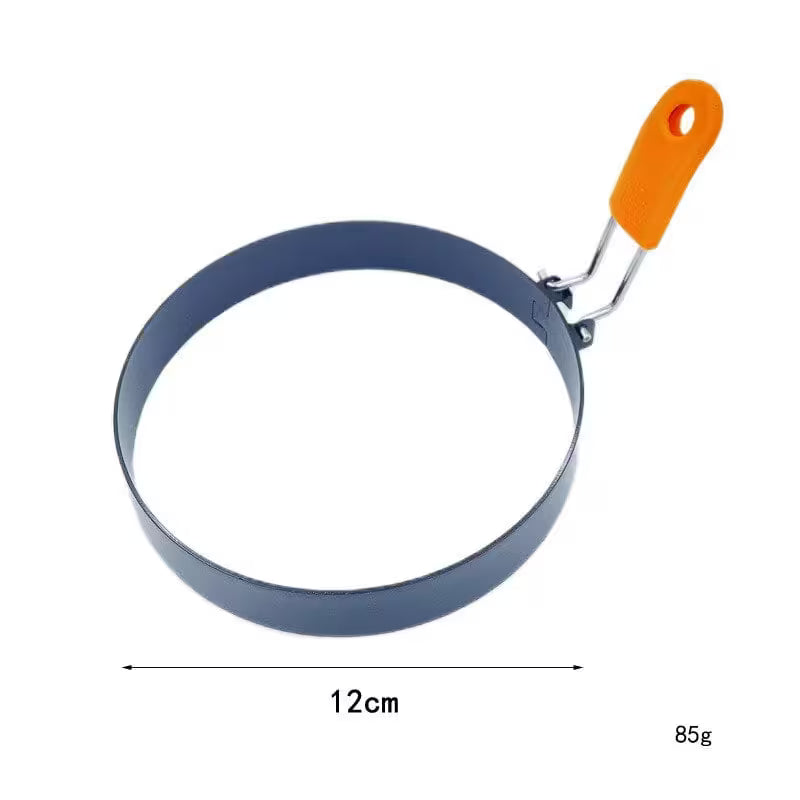 Metal pancake ring with orange handle on a white background