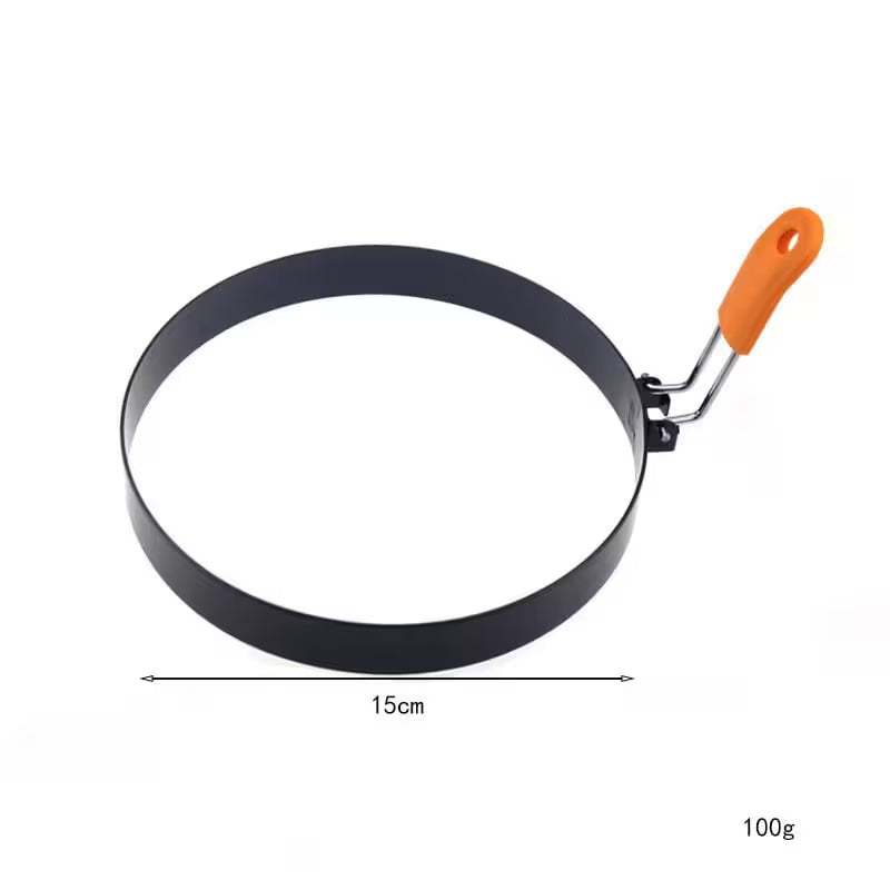 Metal pancake turner with an orange handle on a white background
