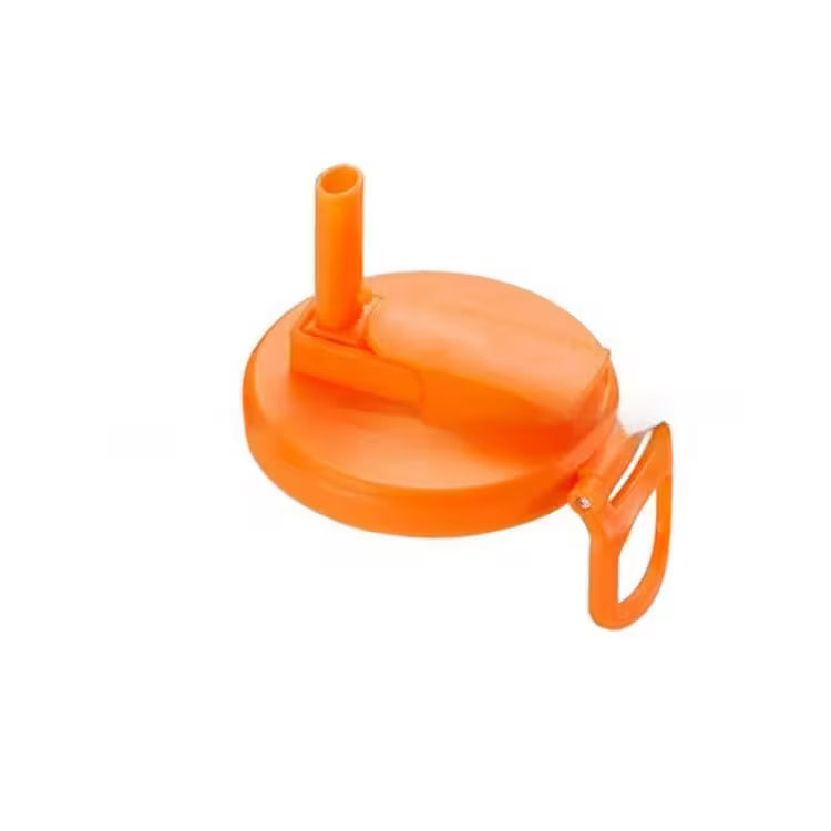 Orange plastic lid with a straw on a white background