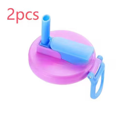 Pink and blue lid with straw attachment on a white background