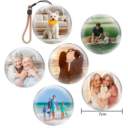 Set of round photo charms with various images including a dog, family, and couple on a beach.
