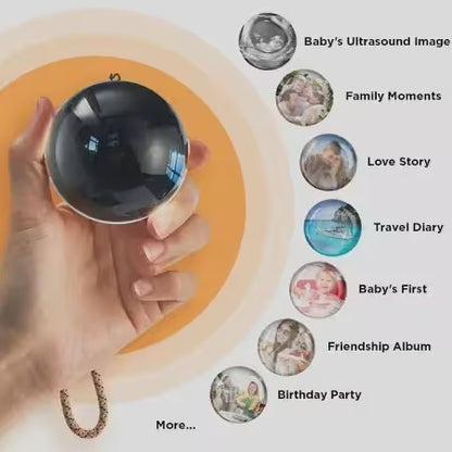 Hand holding a crystal ball with various life event categories displayed around it.