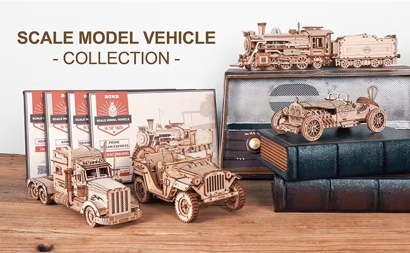Collection of scale model vehicles including a truck, jeep, and train on a wooden surface with a vintage radio in the background.