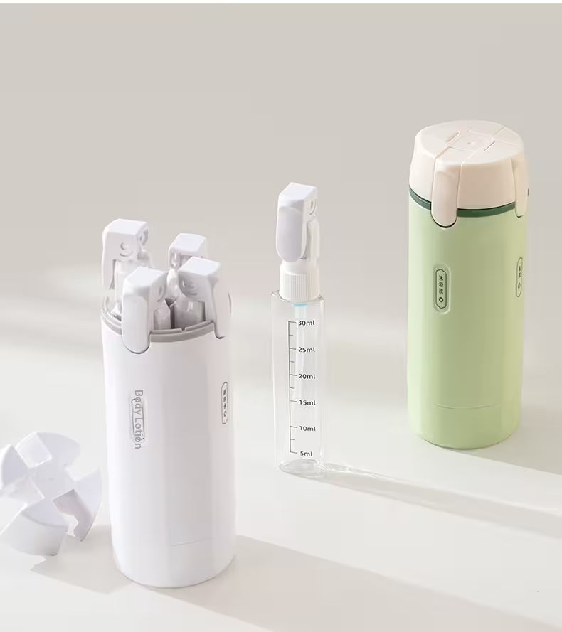 Set of white and green containers on a light background