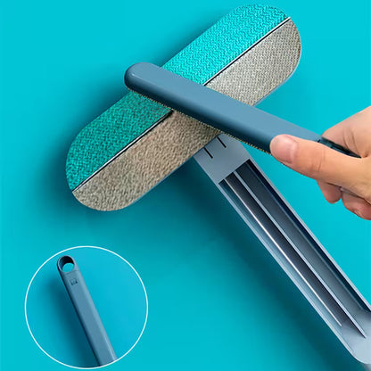Window cleaning tool with microfiber pad on a blue background