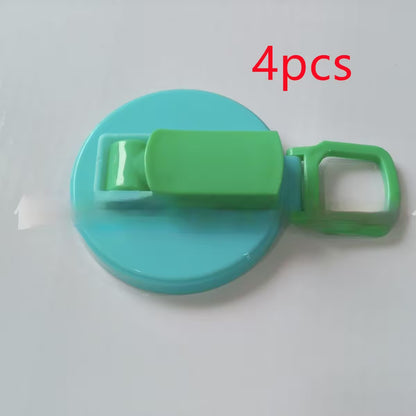 Turquoise and green plastic clip with '4 pcs' text on a white background
