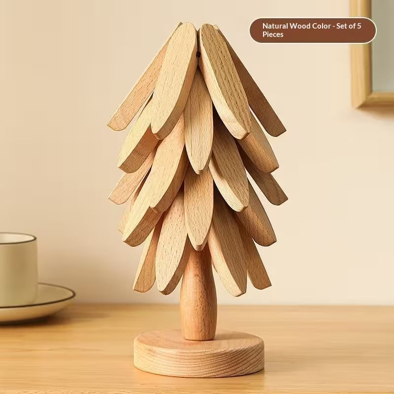 Wooden decorative tree on a wooden surface with a beige background