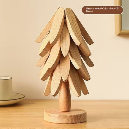 Wooden decorative tree on a wooden surface with a beige background