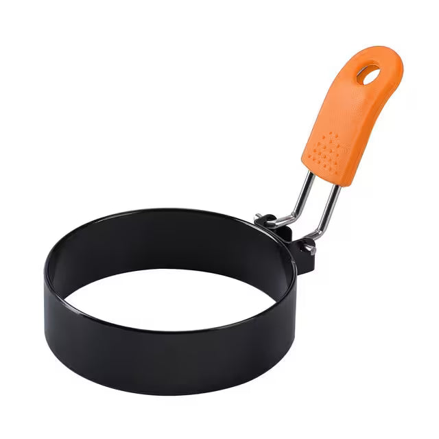 Black metal pancake ring with an orange handle on a white background