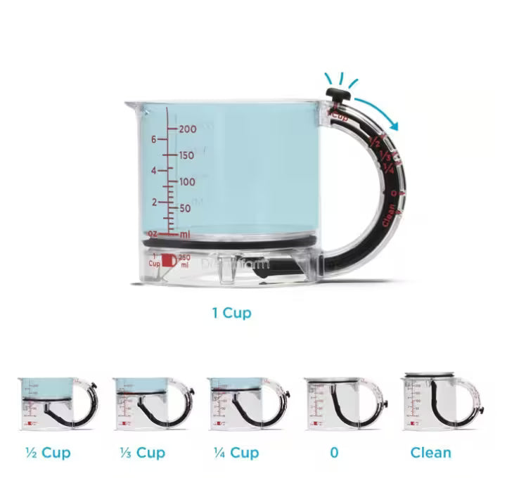 Clear measuring cup with liquid, showing measurements on a white background