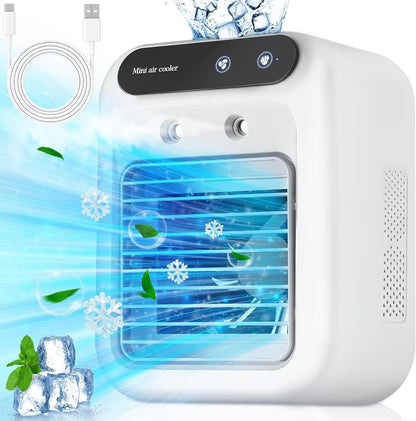 Mini air cooler with ice cubes and water droplets on a white background