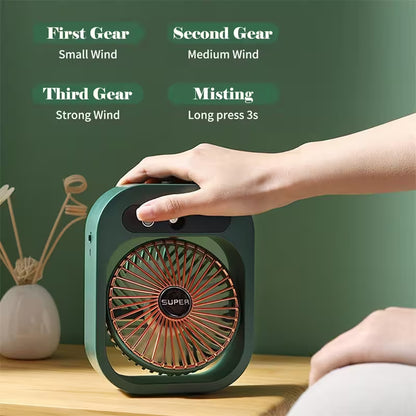 Hand adjusting a portable fan with control options on a green background
