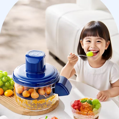 Child eating a bowl of fruit salad next to a blue kitchen appliance on a light-colored surface.