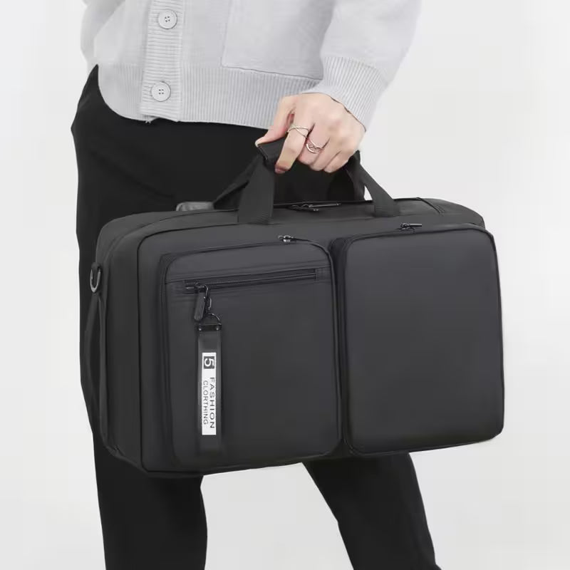 Person holding a black briefcase with a white background
