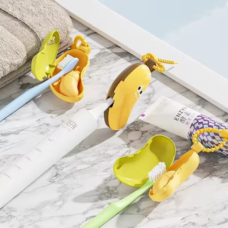 Yellow and green toothbrush holders with toothbrushes on a marble surface.