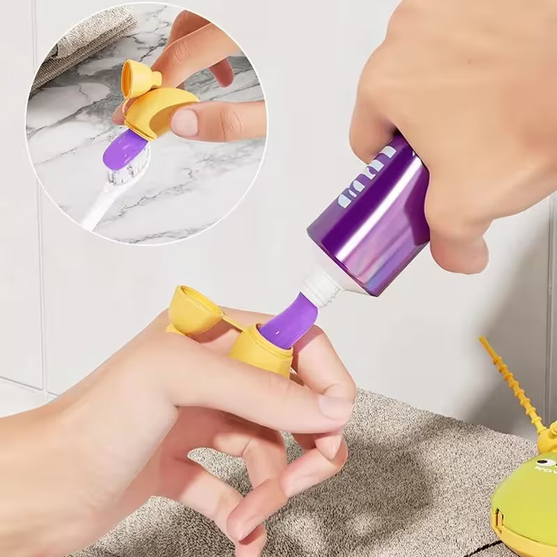 Purple and yellow cleaning tool being used on a carpet with a close-up inset showing the nozzle.