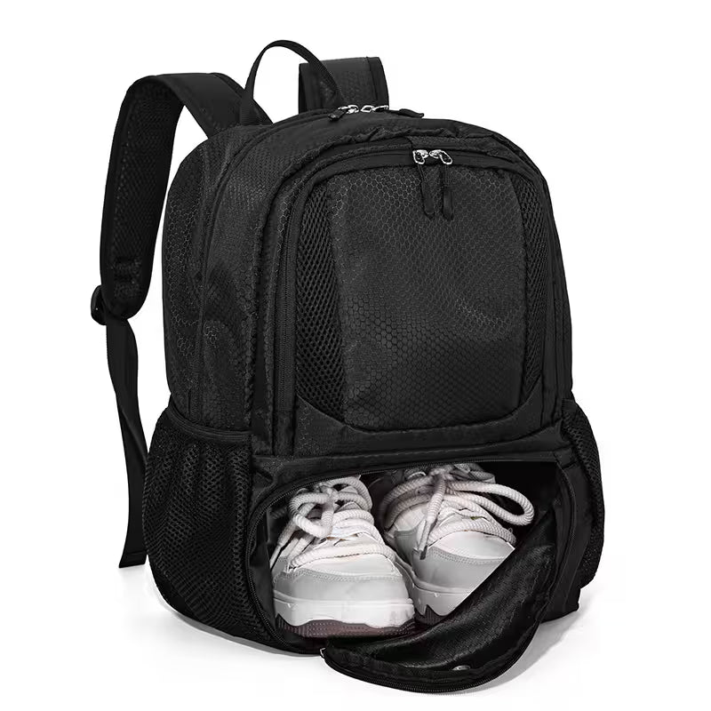 Black backpack with white sneakers inside on a white background