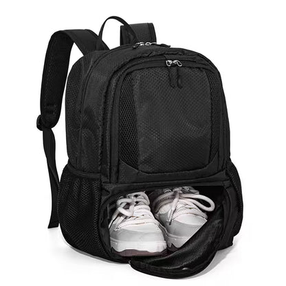 Black backpack with white sneakers inside on a white background