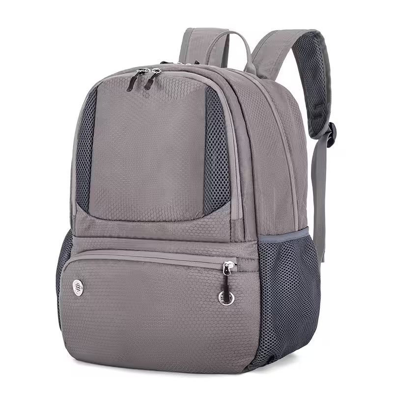 Gray backpack with mesh side panels on a white background