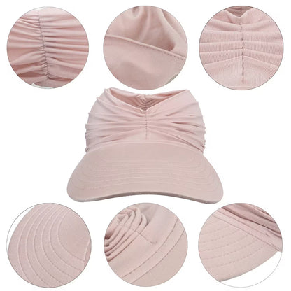 Pink visor hat with close-up details on a white background