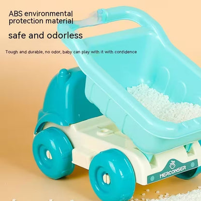 Toy sand truck with blue wheels and a light blue bed on a beige background, featuring text about material safety.
