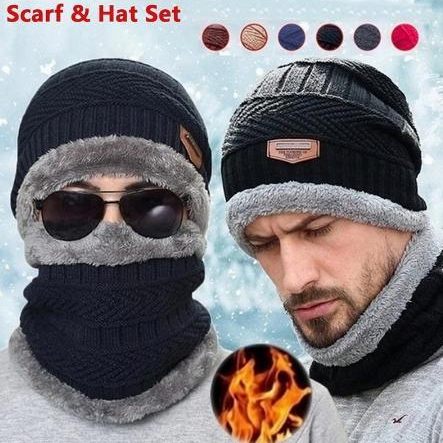 Two men wearing a scarf and hat set with different color options on a snowy background.