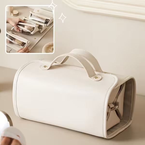 Beige cosmetic bag with handle and tray on a neutral background