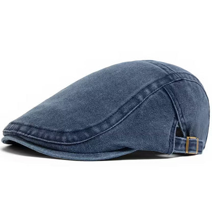 Blue denim cap on a white background