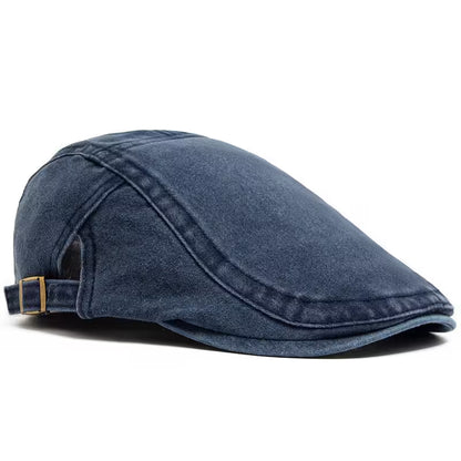 Blue denim cap on a white background