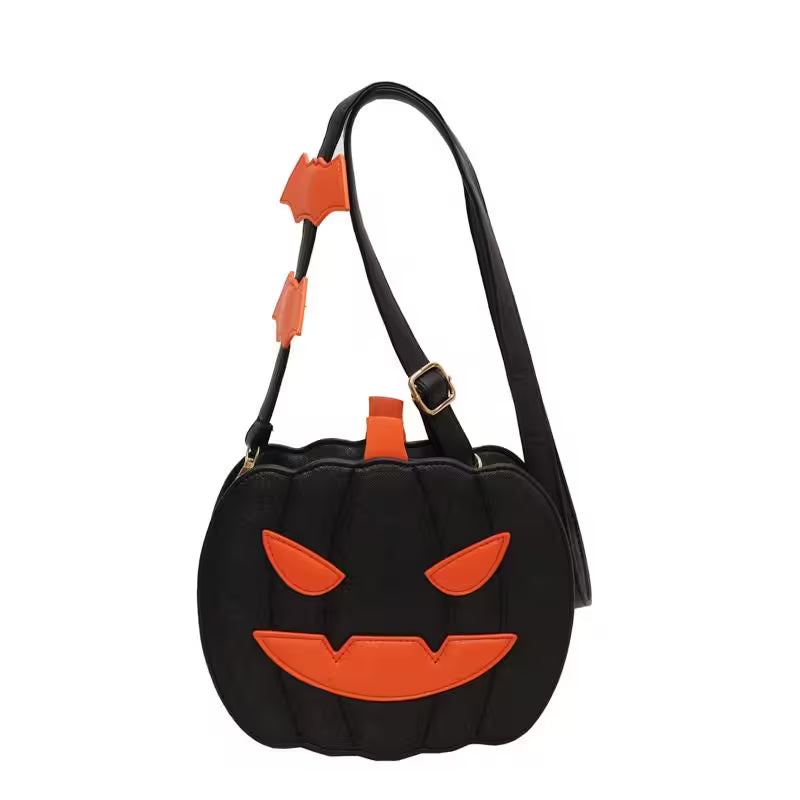 Black pumpkin-shaped handbag with orange accents on a white background