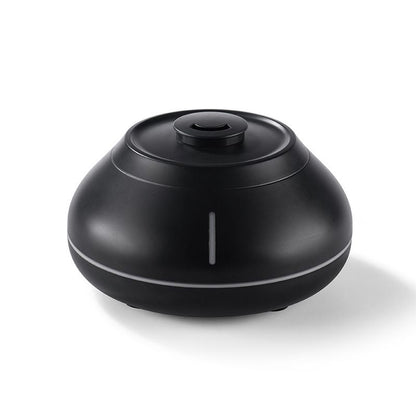Black humidifier on a white background