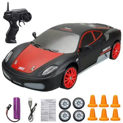 Toy car with remote control, battery, and accessories on a white background